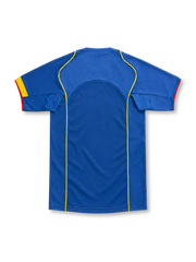 Arsenal 2004/05 blue away jersey with yellow piping, red trim, Nike logo and O2 sponsor