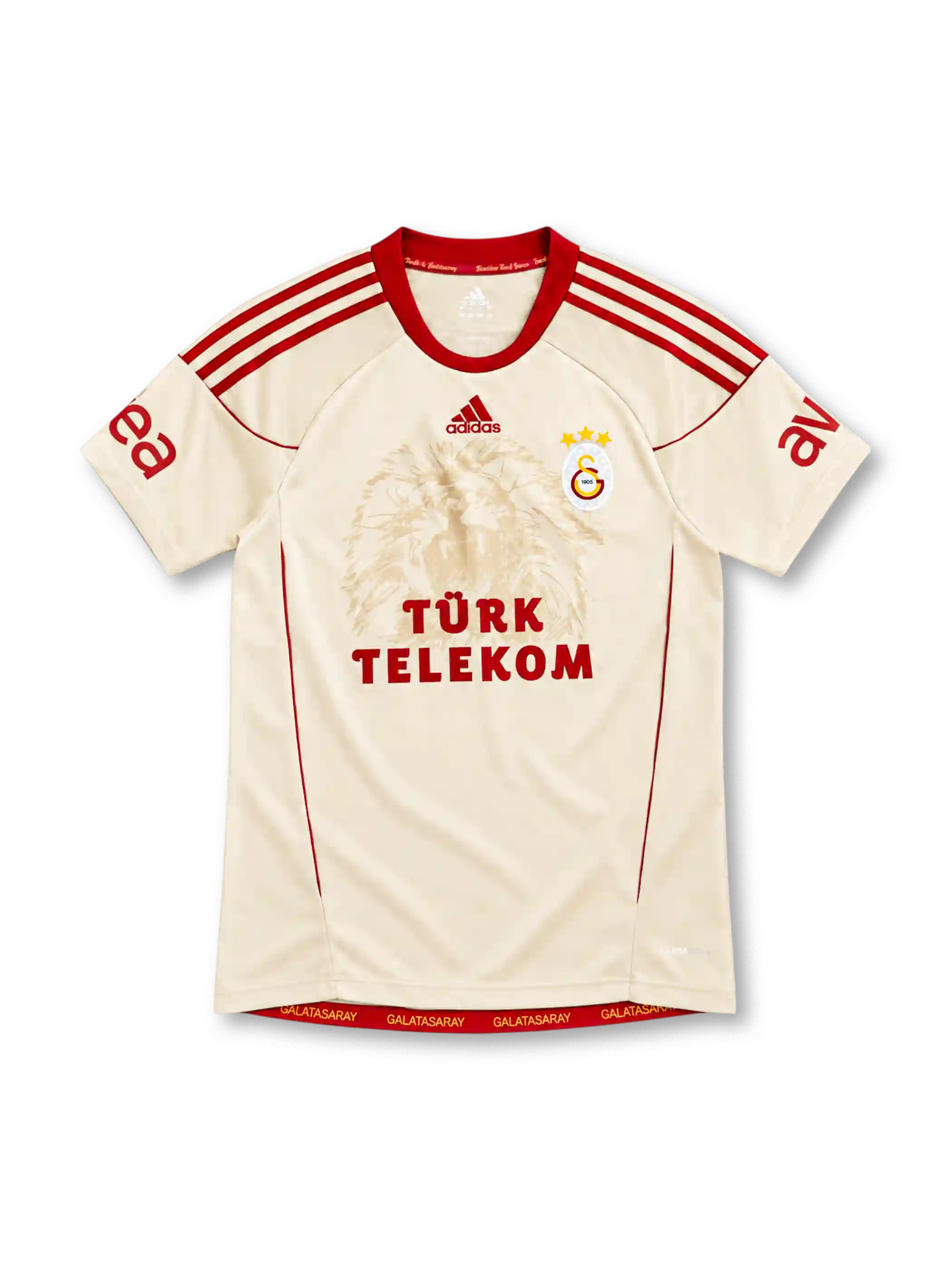 Galatasaray 2010/11 cream away jersey with tonal lion graphic, red adidas stripes and Türk Telekom sponsor