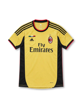 AC Milan 2013/14 gold away jersey with black side panels, adidas logo and Fly Emirates sponsor