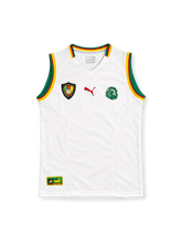 Cameroon 2002 white sleeveless away jersey with green, red and yellow trim, Puma logo and lion emblem