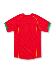 Portugal 2004 red home jersey with tonal pattern, green collar, gold piping, Nike logo and federation crest