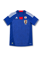 Japan 2010 royal blue home jersey with tonal pattern, red centre panel, white adidas stripes and JFA crest