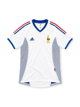 France 2002 white away jersey with blue V-neck, red and blue adidas stripes and gold FFF rooster crest