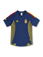 Spain 2002 navy third jersey with red and yellow shoulder stripes, gold-dotted mesh panels and embroidered crest
