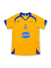 Juventus 2005/06 yellow third jersey with royal blue yoke, Nike logo, centred crest and Tamoil sponsor