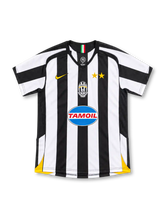 Juventus 2005/06 black and white striped home jersey with gold Nike logo, two gold stars, centred crest and Tamoil sponsor