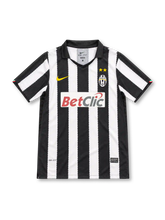 Juventus 2010/11 black and white striped home jersey with polo collar, gold Nike logo, club crest and BetClic sponsor