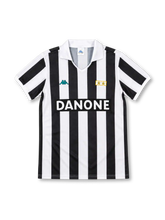 Juventus 1992/94 black and white striped home jersey with open white collar, Kappa logo, two-star patch and Danone sponsor