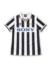 Juventus 1995/97 black and white striped home jersey with white polo collar, Kappa logo, two gold stars and Sony sponsor