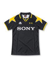 Juventus 1995/97 black away jersey with yellow shoulder stars, yellow-trimmed collar, Kappa logo and Sony sponsor