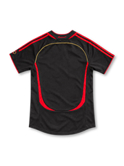 AC Milan 2006/07 third jersey in black with red adidas stripes, gold piping, club crest and white bwin sponsor.