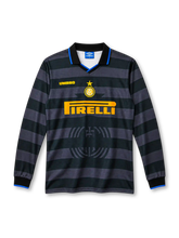 Inter Milan 1997/98 third long sleeve jersey with black and gray horizontal stripes, blue collar trim, yellow Pirelli sponsor and Umbro branding.