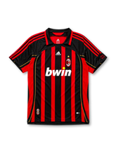 AC Milan 2006-07 home jersey in red and black with gold trim