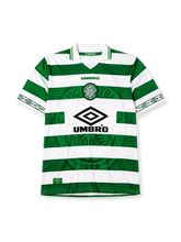 Celtic 1998-99 home jersey, front view, green and white hoops, tonal crest pattern, white collar with celtic wordmark, Umbro wordmark, club badge with 1888 text, large Umbro diamond logo, diamond-patterned cuffs
