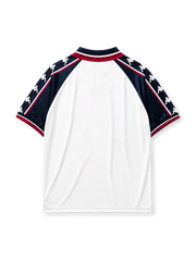 Manchester City 1997-98 away jersey, front view, navy upper body with white and maroon lower blocks, point collar with M.C.F.C. text, Kappa Omini sleeve pattern, club crest, Brother sponsor logo