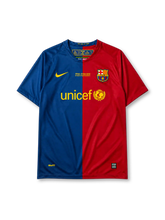 Barcelona 2008-09 Champions League final home jersey, front view, blue and red vertical halves, Nike swoosh, Final Roma 2009 commemorative text, club crest, UNICEF sponsor logo, NikeFIT hem tag