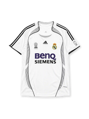Real Madrid 2006-07 home jersey, front view, white body with grey Formotion panels, black adidas three-stripe shoulder detailing, FIFA Best Club of the Century emblem, LFP league patch, adidas logo, club crest, BenQ Siemens sponsor logo