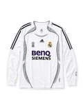 Real Madrid 2006-07 long sleeve home jersey, front view, white body with grey Formotion panels, black adidas three-stripe long sleeve detailing, FIFA Best Club of the Century emblem, adidas logo, club crest, BenQ Siemens sponsor logo