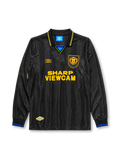 Manchester United 1993-94 away long sleeve jersey, front view, black body with tonal diamond jacquard pattern, gold and blue striped collar, Umbro diamond logo, club crest, SHARP Viewcam sponsor logo, gold and blue diamond cuffs