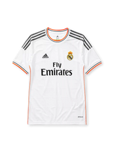 Real Madrid 2013-14 home jersey, front view, white body, grey adidas three-stripe shoulder detailing, orange piping, crew neck collar, adidas logo, club crest, Fly Emirates sponsor logo, climacool label