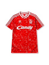 Liverpool 1989-91 home jersey, front view, red body with white splatter and triangle print, white V-neck collar, adidas three-stripe shoulder detailing, adidas trefoil logo, club crest, Candy sponsor logo