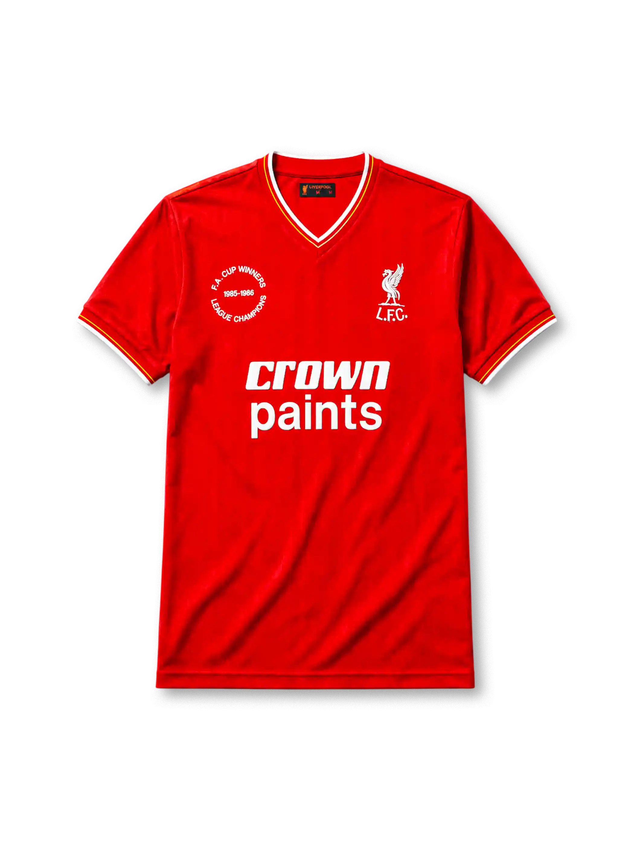Liverpool 1985-86 home jersey, front view, red body, white V-neck collar with red and yellow stripe trim, white cuffs with yellow stripe, white L.F.C. liver bird crest, white Crown Paints sponsor logo, circular 1985-1986 double winners badge on left chest
