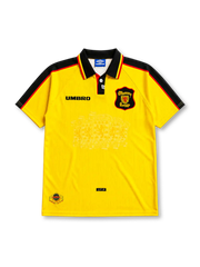 Scotland 1996-98 away jersey, front view, bright yellow body with black raglan sleeve panels, red and yellow piping trim, black polo-style collar, black Umbro logo, Scottish Football Association crest with red lion, tonal jacquard pattern, S.F.A. tab near hem