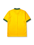 Bayern Munich 1993-95 away jersey, front view, golden yellow body with diagonal green and black stripe panels, green V-neck collar with black piping, black adidas Equipment logo, FC Bayern Munchen crest, black Opel sponsor logo, striped cuffs