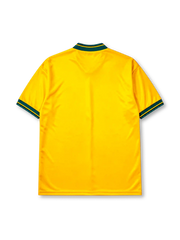 Bayern Munich 1993-95 away jersey, front view, golden yellow body with diagonal green and black stripe panels, green V-neck collar with black piping, black adidas Equipment logo, FC Bayern Munchen crest, black Opel sponsor logo, striped cuffs