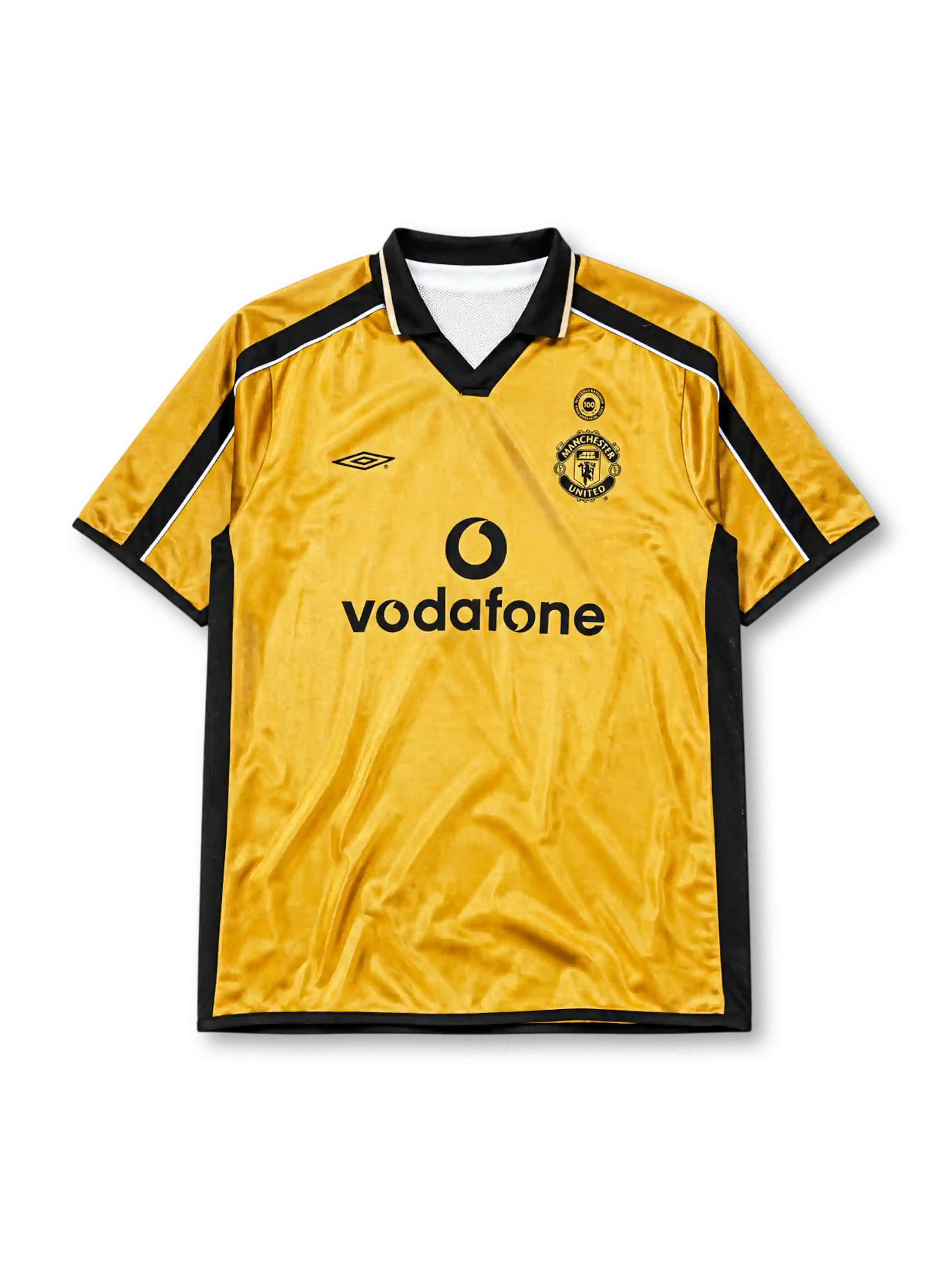 Manchester United 2001-02 away jersey, front view, gold body with black side panels, black V-neck collar with white piping, black Umbro logo, Manchester United devil crest and centenary 100 badge, black Vodafone sponsor logo