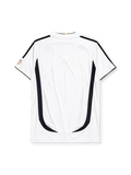 Germany 2006 home jersey, front view, white body with curved red and gold side panels, black shoulder panels, black adidas logo and stripes, three gold stars, DFB eagle crest, small tournament emblem on sleeve