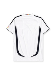 Germany 2006 home jersey, front view, white body with curved red and gold side panels, black shoulder panels, black adidas logo and stripes, three gold stars, DFB eagle crest, small tournament emblem on sleeve