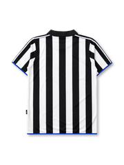 Newcastle United 1999-00 home jersey, front view, black and white vertical stripes, black polo-style collar with blue inset, white adidas logo, Newcastle United shield crest, circular Newcastle Brown Ale star sponsor badge