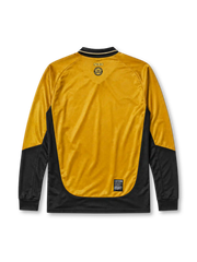 Manchester United 2001-02 away long-sleeve jersey, front view, gold body with black side panels and long sleeves, black V-neck collar with white piping, black Umbro logo, Manchester United shield crest, black Vodafone sponsor logo