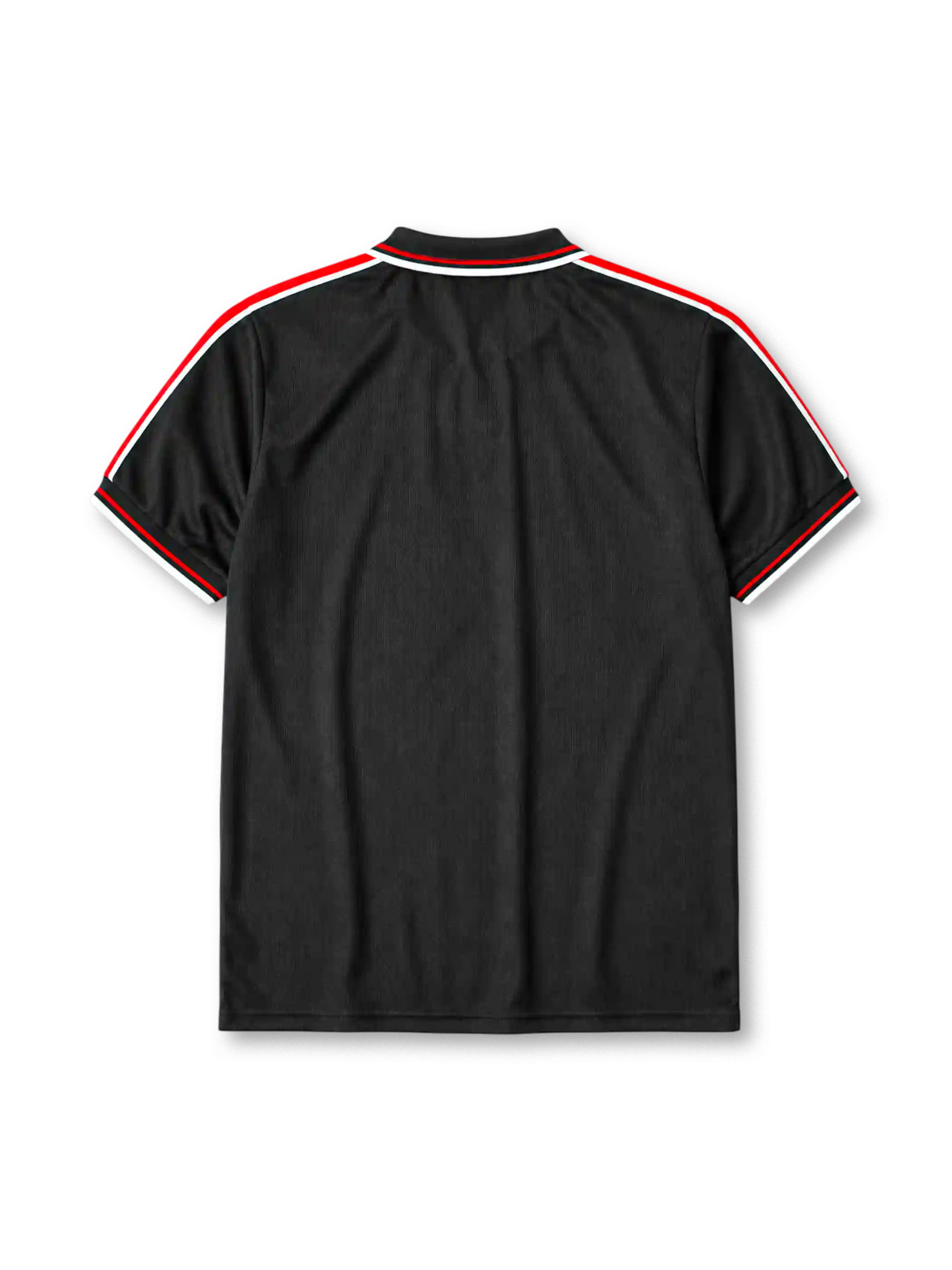 Manchester United 1998-99 third jersey, front view, black body, black white and red diamond pattern shoulder trim, black polo-style collar with zip placket, white Umbro logo, Manchester United devil crest, white Sharp sponsor logo