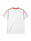 Liverpool 1989-91 away jersey, front view, white body with grey geometric diamond pattern, red V-neck collar, red adidas trefoil logo and stripes, Liverpool shield crest with liver bird, red Candy script sponsor logo