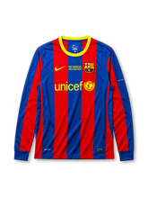 Barcelona 2010-11 home long-sleeve jersey, front view, blue and garnet vertical stripes, yellow-trimmed crew-neck collar, yellow Nike swoosh, Final London 2011 commemorative text, Barcelona crest, yellow unicef sponsor logo, Catalan motto text on sleeve