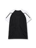 Real Madrid 2001-02 away jersey, front view, black body with white raglan sleeves, white polo-style collar, black adidas logo and stripes, Real Madrid crest with crown, white Realmadrid.com sponsor logo