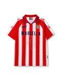 Atletico Madrid 1995-96 home jersey, front view, red and white vertical stripes with printed honors and championship years, red polo-style collar with navy chain pattern, navy Puma logo, Atletico Madrid shield crest, navy Marbella sponsor logo