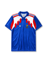 France 1990 home football jersey by Adidas with red white chevron design