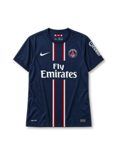 Paris Saint-Germain 2012-13 home jersey in navy with Fly Emirates sponsor and red-white center stripes
