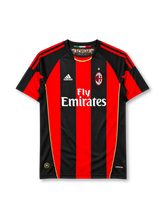 AC Milan 2010-11 home jersey adidas front view red black stripes