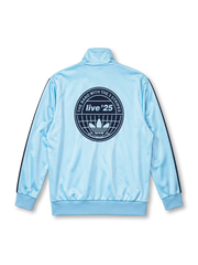 adidas x Oasis Firebird track top sky blue front view with navy three stripes, trefoil logo, and oasis wordmark patch