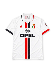 AC Milan 1996-97 away jersey, front view, white body with central red and black stripe, striped collar, Lotto logo, Opel sponsor logo, Scudetto shield