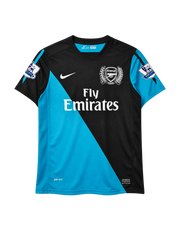 Arsenal 2011-12 away jersey, front view, black and sky blue diagonal split, Nike swoosh, Fly Emirates sponsor logo, 125th anniversary crest, Premier League sleeve patches