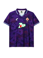 Fiorentina 1992-93 home jersey, front view, purple body with abstract crosshatch pattern, striped collar, Lotto logo, 7Up sponsor logo, diamond club crest