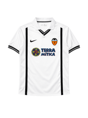 Valencia 2000-01 home jersey, front view, white body with black vertical stripes, Nike swoosh, Terra Mitica sponsor logo, club crest