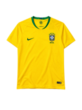 Brazil 2018 World Cup home jersey, front view, yellow body with green collar, Brasil lettering, Nike swoosh, CBF crest with five stars