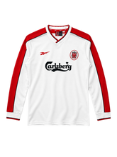 Liverpool 1998-99 long-sleeve away jersey, front view, white body with red shoulder panels, Reebok logo, Carlsberg sponsor logo, oval club crest
