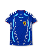 Japan 2006-07 home jersey in blue with flame graphics and JFA crest